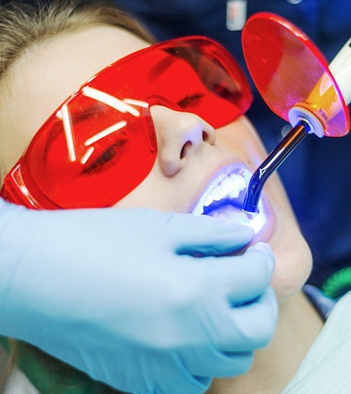 Patient receiving tooth colored filling treatment