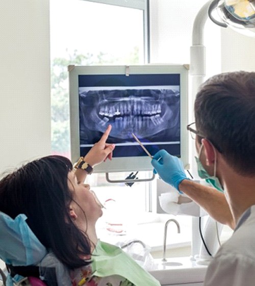 emergency dentist in North Grafton showing a patient their X-rays