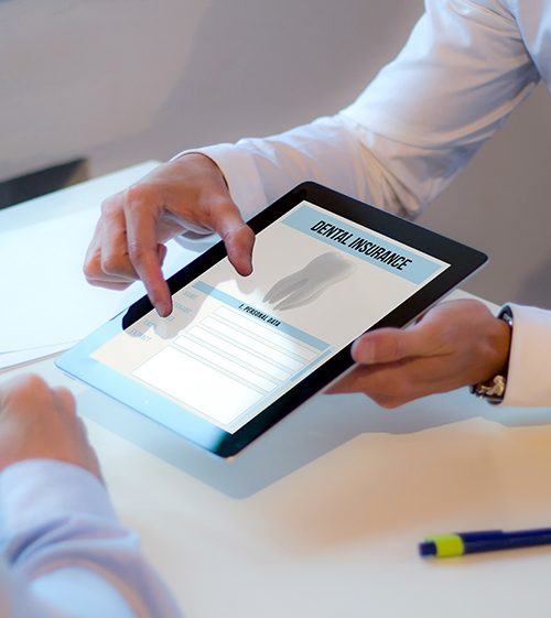 Dental insurance forms on tablet computer