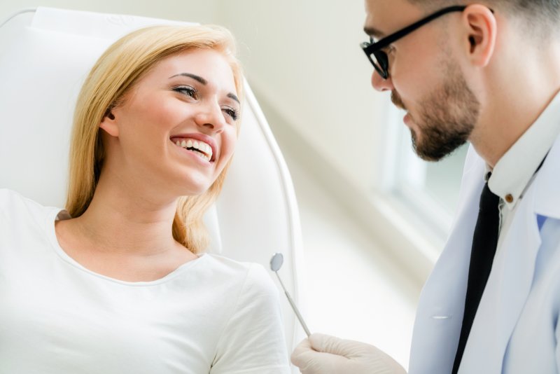 patient talking with a cosmetic dentist in North Grafton
